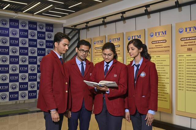 Students at the ITM display wall